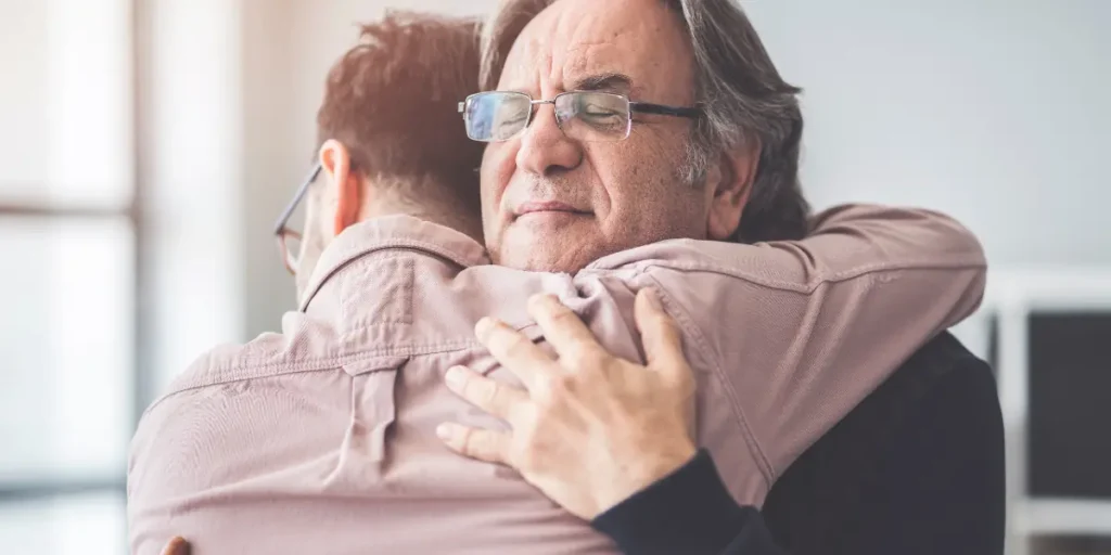 Two people hugging